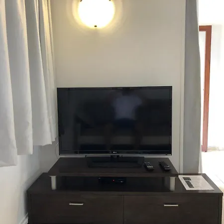 Апартаменты Sunny Near The Beach With Wifi, Balcony And Pool *